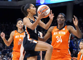 							                                Team Stewarts Skylar Diggins-Smith, center, drives to the basket against Team Wilsons Candace Parker, left, and Sylvia Fowles during the first half of a WNBA All-Star basketball game in Chicago, Sunday, July 10, 2022. (AP Photo/Nam Y. Huh) 					