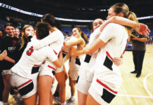 							                                Crestwood players celebrates the school’s first-ever girls basketball district championship after defeating Dallas 54-31 in the District 2 Class 5A title game at Mohegan Arena on Saturday night. 					