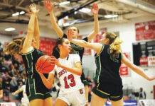 							                                Crestwood’s Jackie Gallagher looks to pass late in the fourth quarter while being swarmed by Archbishop Wood defenders. The Comets fell to the Vikings in Saturday’s PIAA Class 5A semifinals at Parkland High School.                                 Fred Adams | For Times Leader					