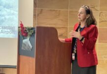 							                                Wilkes-Barre/Scranton International Airport Acting Executive Director BJ Teichman reports at Thursdays meeting of the Bi-County Airport Board.                                 Bill O’Boyle | Times Leader					