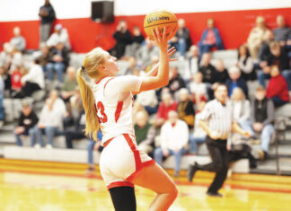 							                                Crestwoods Keira Dougherty scores on an uncontested layup against Abington Heights.                                 Buck Norton-Jennings | For Times Leader					