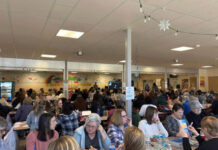 							                                A room full of bingo attendees from the Purse Bingo.                                 via Facebook					