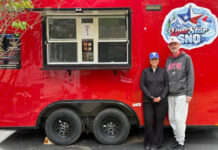 							                                Susan and Jay Thomas stand together in front of their shaved-ice truck, LoneStar Sno.                                 Photo via Jay Thomas					