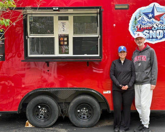 Crestwood music teacher starts shaved ice business with wife Susan and Jay Thomas stand together in front of their shaved-ice truck, LoneStar Sno. Photo via Jay Thomas