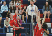 H.S. Boys Volleyball: Holy Redeemer rallies past Crestwood to reign again Holy Redeemers Jack McCue (23) records a kill against Crestwood. Mark Moran | For Times Leader