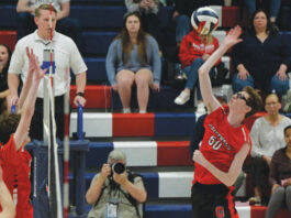 							                                Crestwoods Eric Rinehimer (50) records a kill against Holy Redeemer.                                 Mark Moran | For Times Leader					